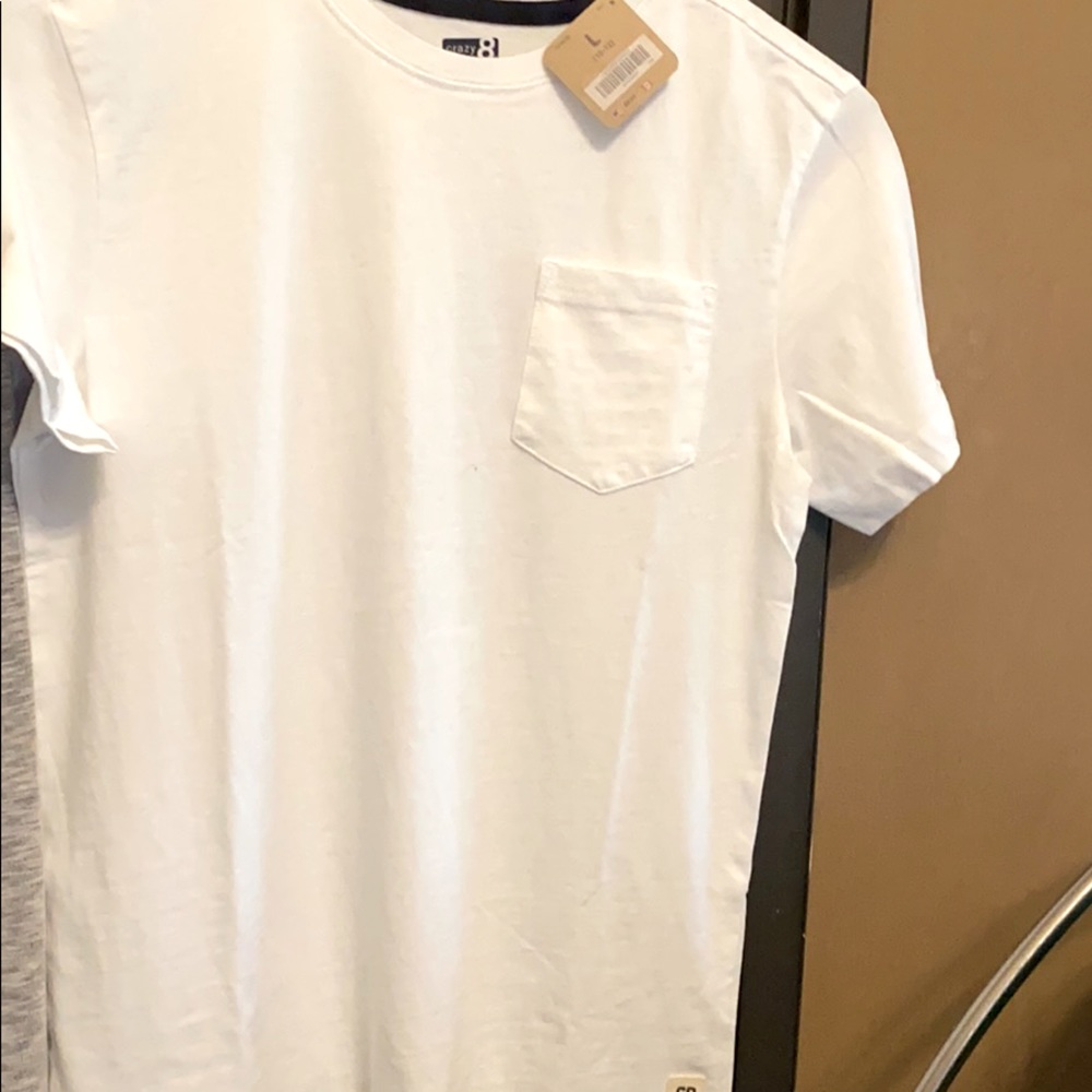 Boys Sz L white pocket tee from Crazy8